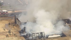 Two-alarm fire destroys building near Cabarrus-Mecklenburg County line