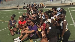 Bryce Young makes surprise appearance at Charlotte schools, football practices