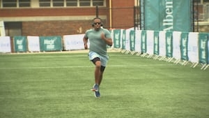 Professional runners warm up as the second annual Meck Mile is underway