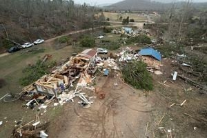 Storm responsible for 26 US deaths heads toward North Carolina