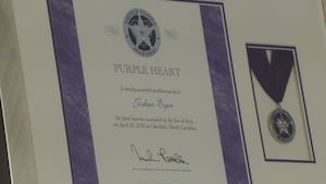 Fallen Charlotte officers awarded Purple Heart; families promised lifelong support