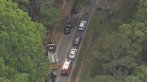 1 killed after car flips through wall on Beatties Ford Road in Huntersville