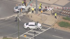 Heavy police presence spotted after car crashes into light rail crossing in north Charlotte