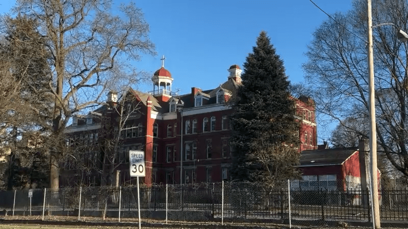 Syracuse's north side residents air their frustrations the fire-damaged building on Maria Regina campus
