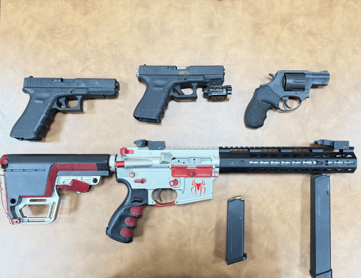 Two in custody after firearms were found in stolen New York vehicle