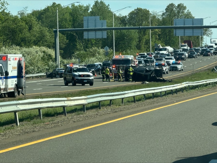 Car catches on fire, multiple people hospitalized after rollover crash on I-91 in North Haven