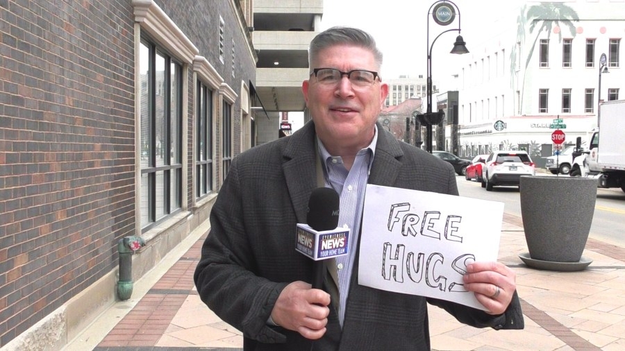 Rockford celebrates ‘National Hug a Newsperson Day' with warm embraces