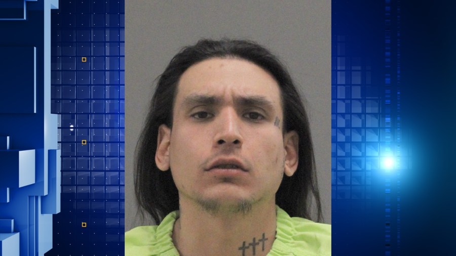 Man on trial for fleeing police arrested on weapons charges in Rockford