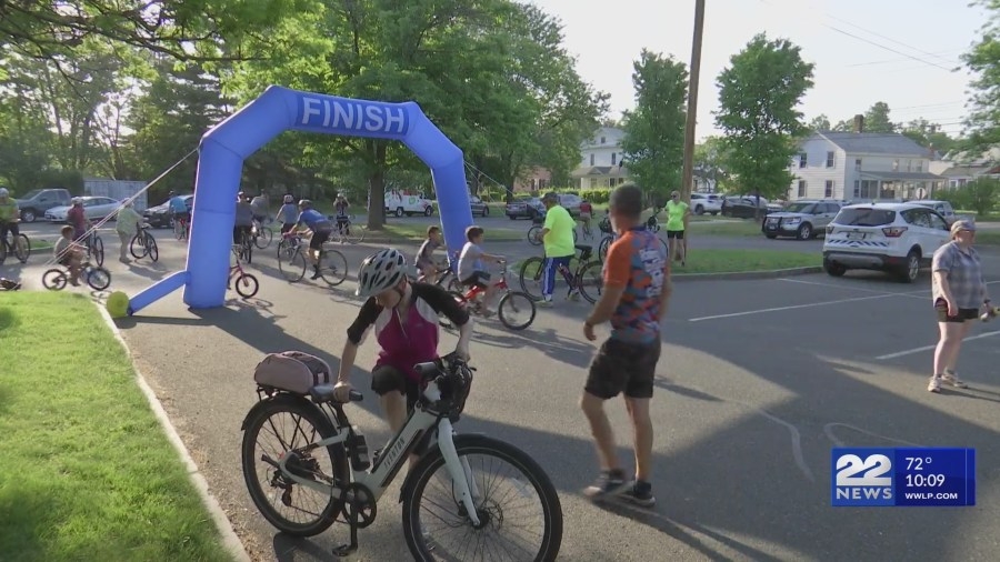 Bike ride with Westfield mayor along city streets and rail trail to promote safer streets