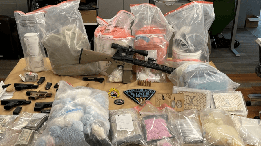 Man arrested in Lawrence after fentanyl stash found behind hidden door