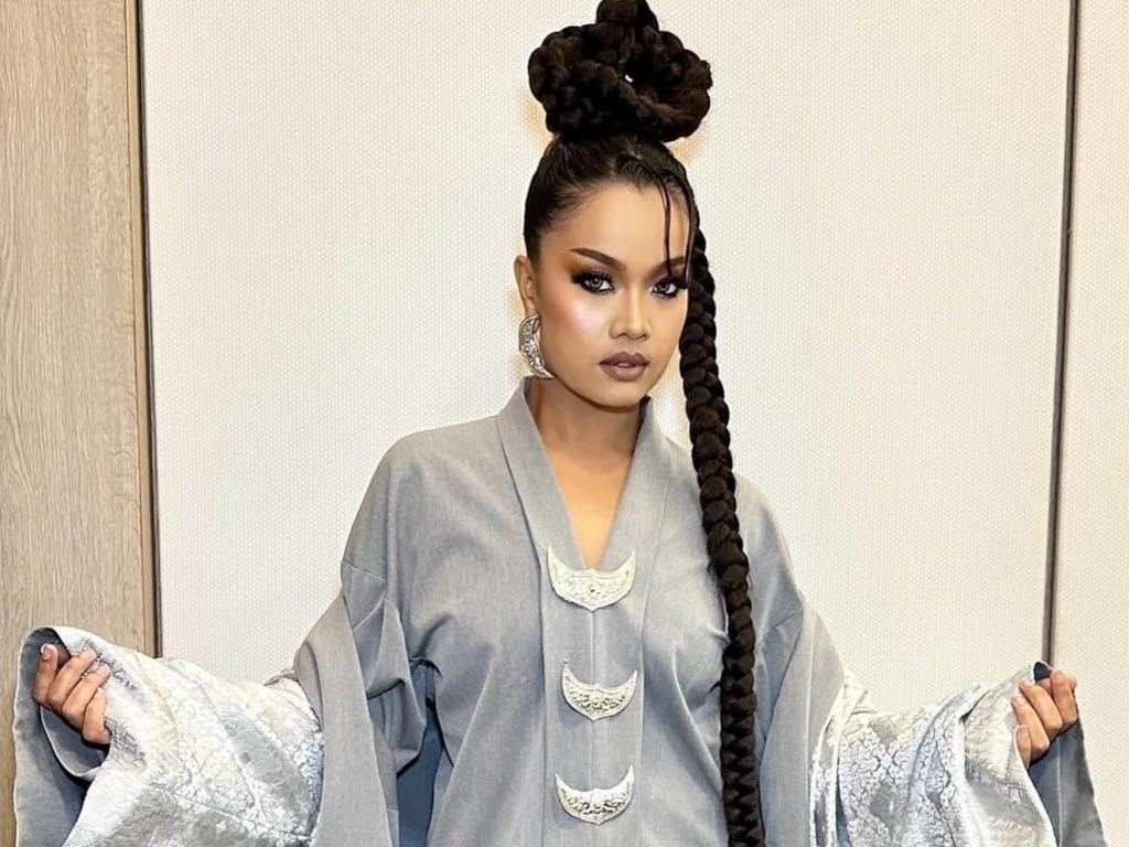 Mimi Fly won't let past successes influence next single