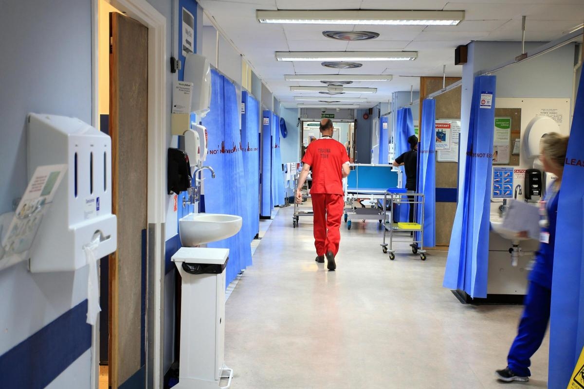 Fewer people face 12-hour hospital trolley waits - but numbers still 'appalling'