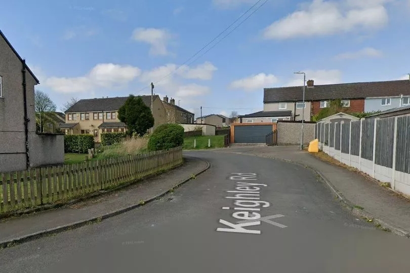 Woman found dead in Halifax road as man arrested
