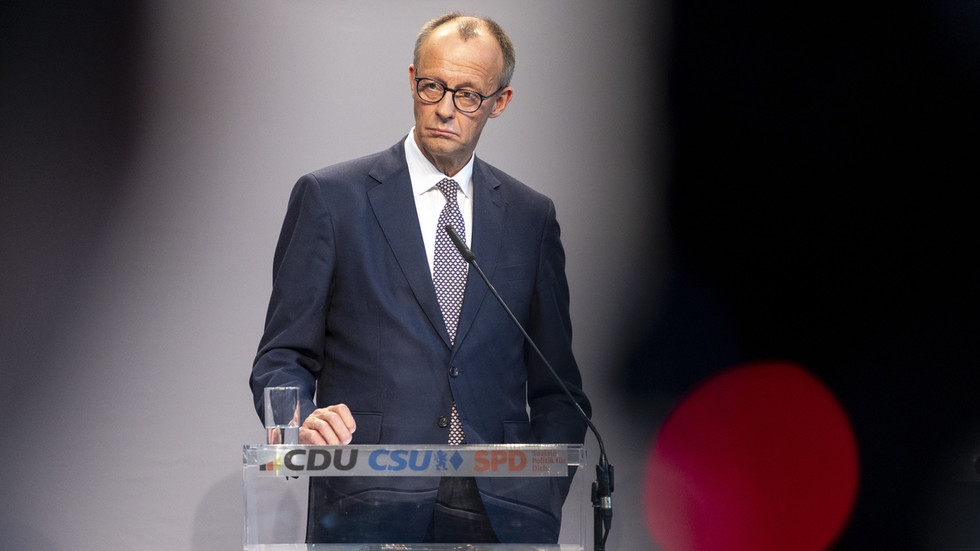 Germany wants the UK to hold its hand while it starts WWIII