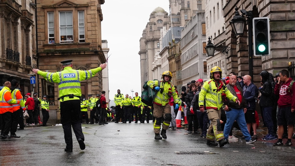 Car plows into crowd at Liverpool football celebrations