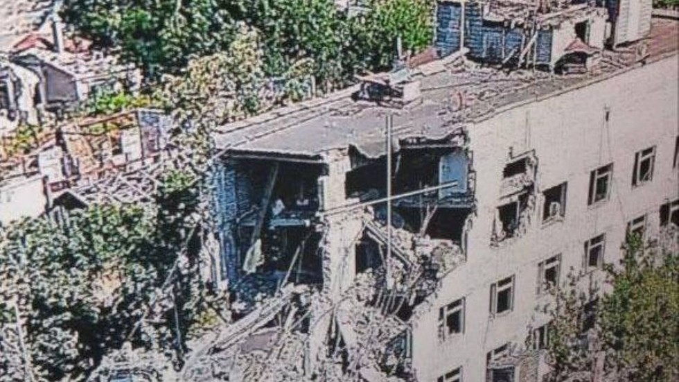 Civilians trapped after Ukrainian airstrike hits apartment block