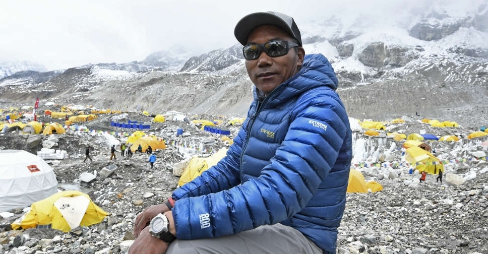 Nepali Sherpa scales Mount Everest for a record 31st time