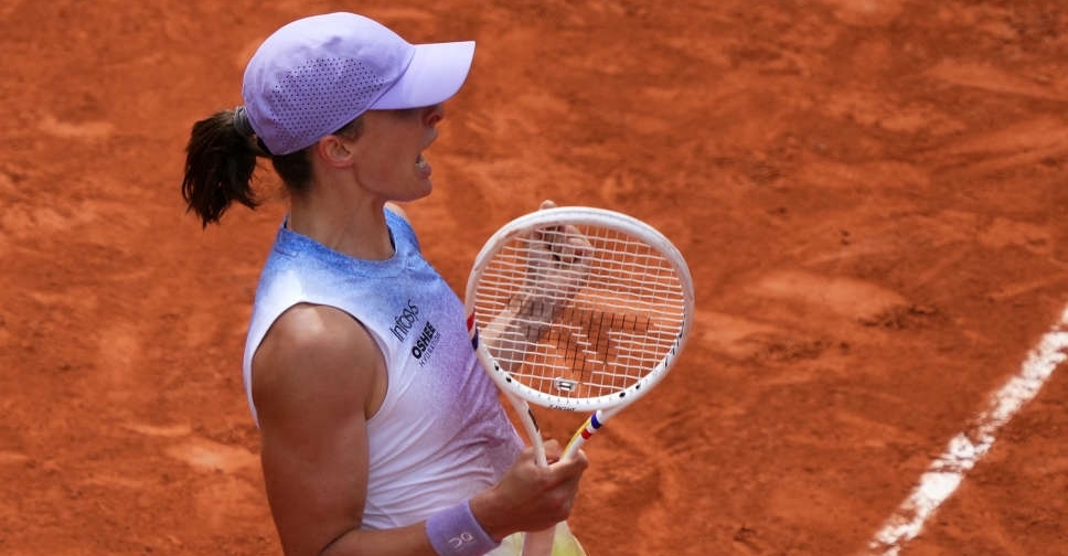 Swiatek digs herself out of deep hole, Alcaraz powers on at French Open