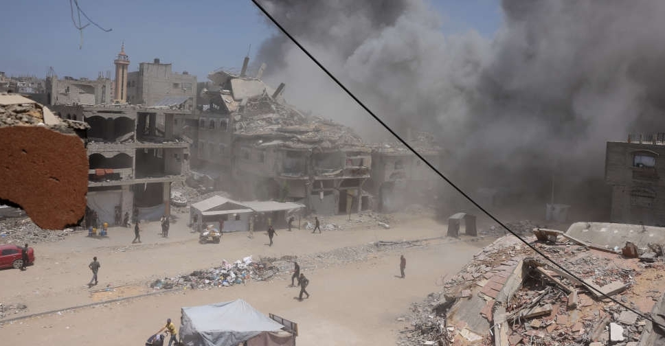Three killed and dozens wounded at Gaza aid site, medics say