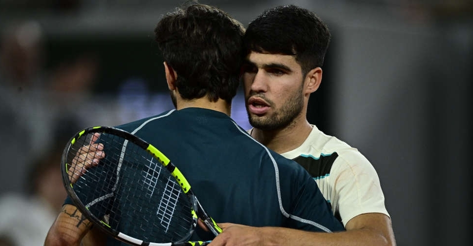 Alcaraz returns to French Open final after ailing Musetti retires