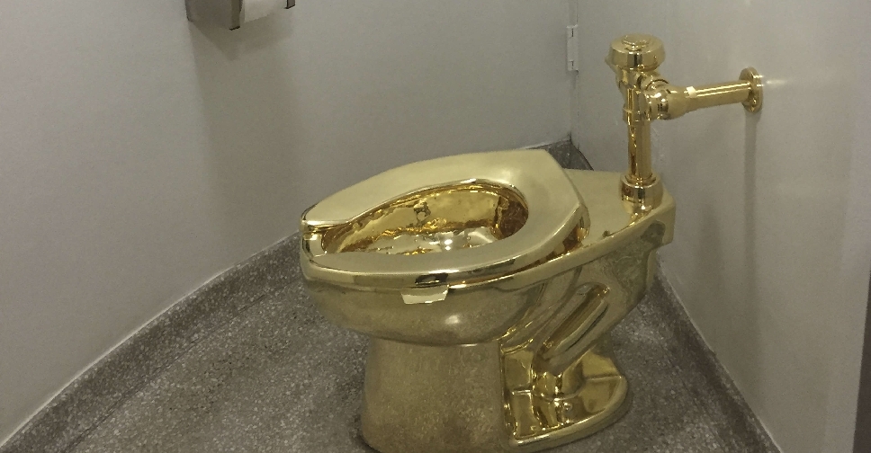 Two jailed for stealing $6 million golden toilet from Churchill's birthplace