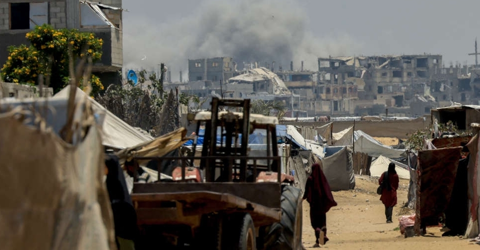 Israeli fire kills 12 people in Gaza, medics say