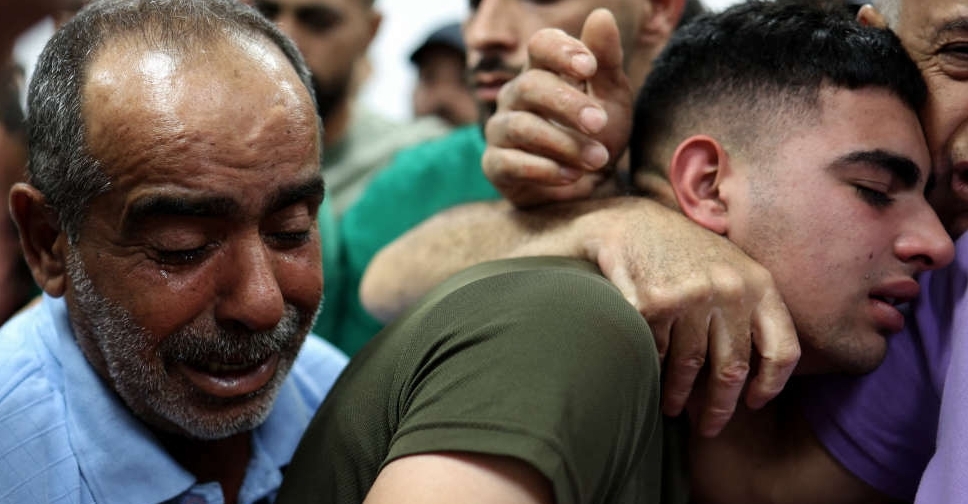 Israeli settlers raid West Bank town, troops kill 3 Palestinians