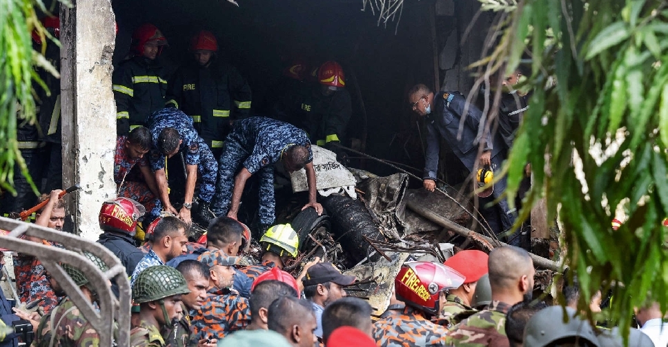 At least 27 killed as Bangladesh air force plane crashes into school campus