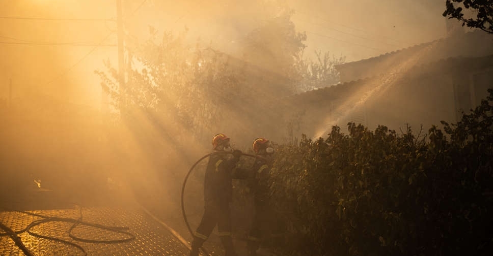 Greece battles wildfires across country, evacuates villages