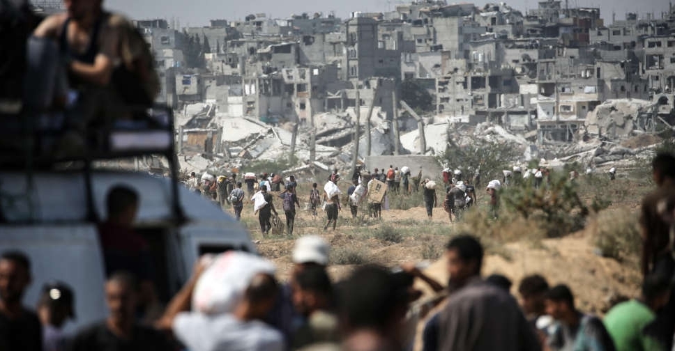 Hamas says it will allow aid for hostages if Israel halts airstrikes