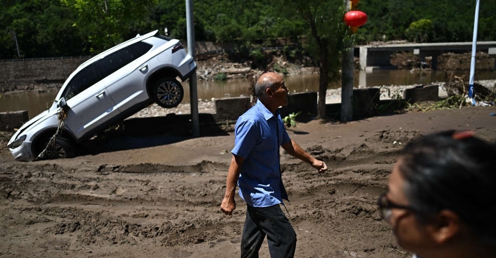 Beijing expands storm alert as fatal floods keep city on edge