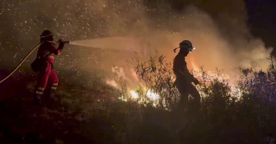 Firefighters battle 'fire whirls' in northern Spain
