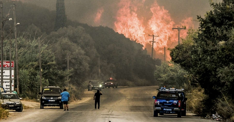 Wildfires scorch Greece for a second day, thousands evacuated