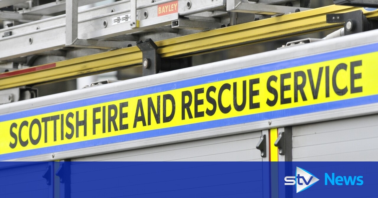 Two people taken to hospital following flat fire