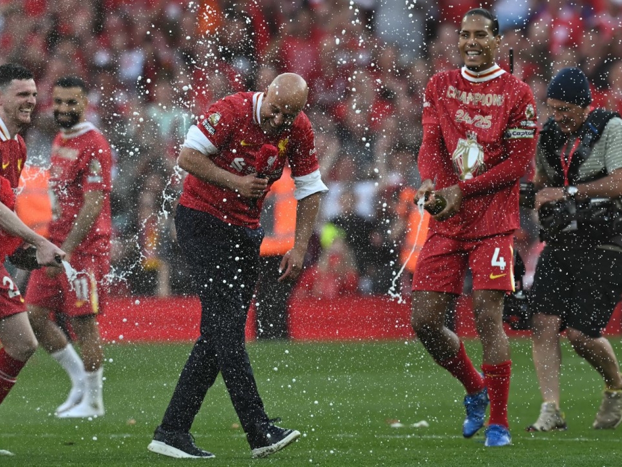 Liverpool thrash Spurs to take Premier League title