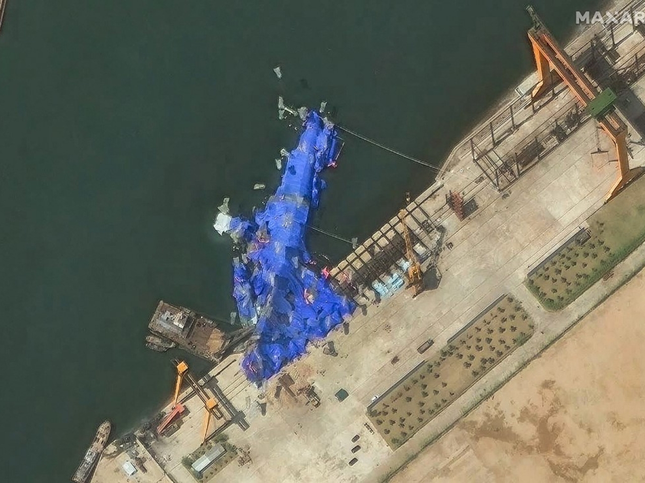 North Korea detains three over warship accident