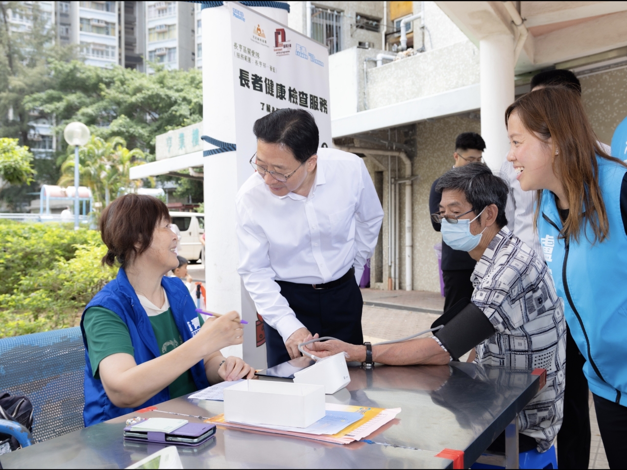 Liaison office director Zhou Ji pays district visits