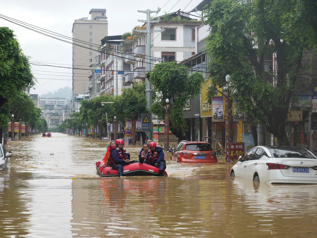 Over 80,000 evacuated as floods hit southwest