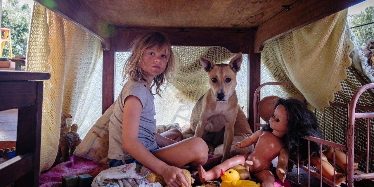 ‘Don't Let's Go to the Dogs Tonight' Review: Growing Pains on a Global Stage