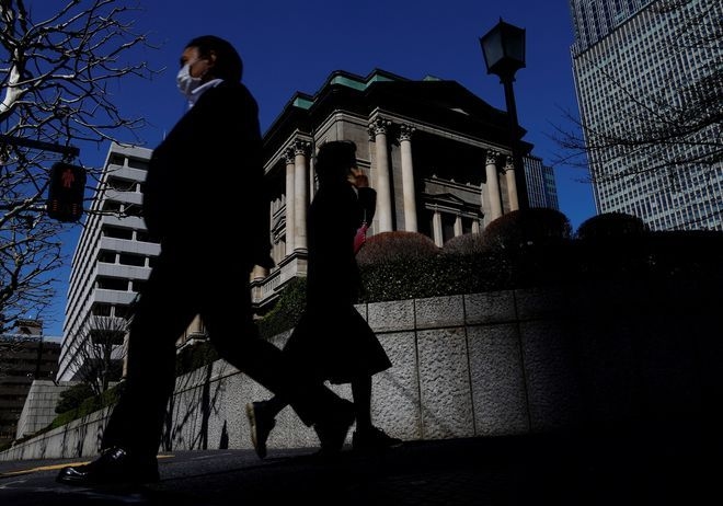 Japan government to consider cutting this year's growth forecast, sources say