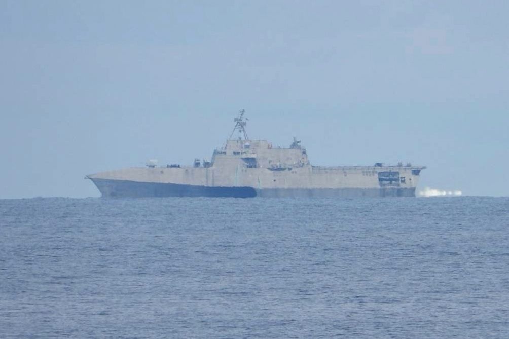 U.S. briefly deploys 2 warships to a disputed South China Sea shoal after Chinese collision