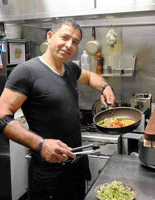 Palestinian chef serves mother's recipes from occupied home
