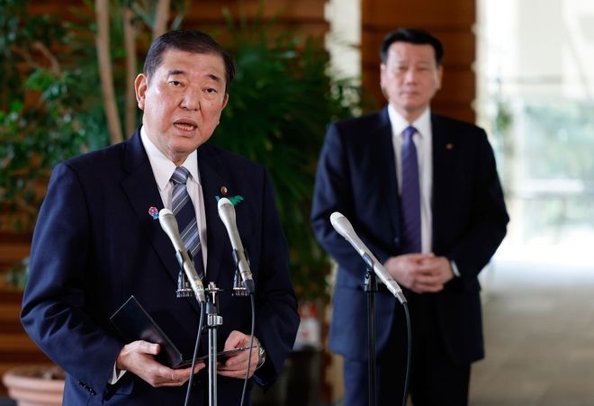 Threatened by Trump tariffs, Japan walks a delicate tightrope between U.S. and China