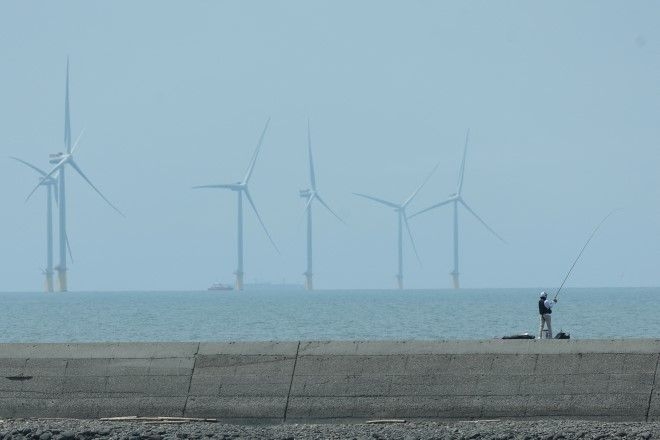 Taiwan's ambitious drive for renewable energy troubles some fishing communities