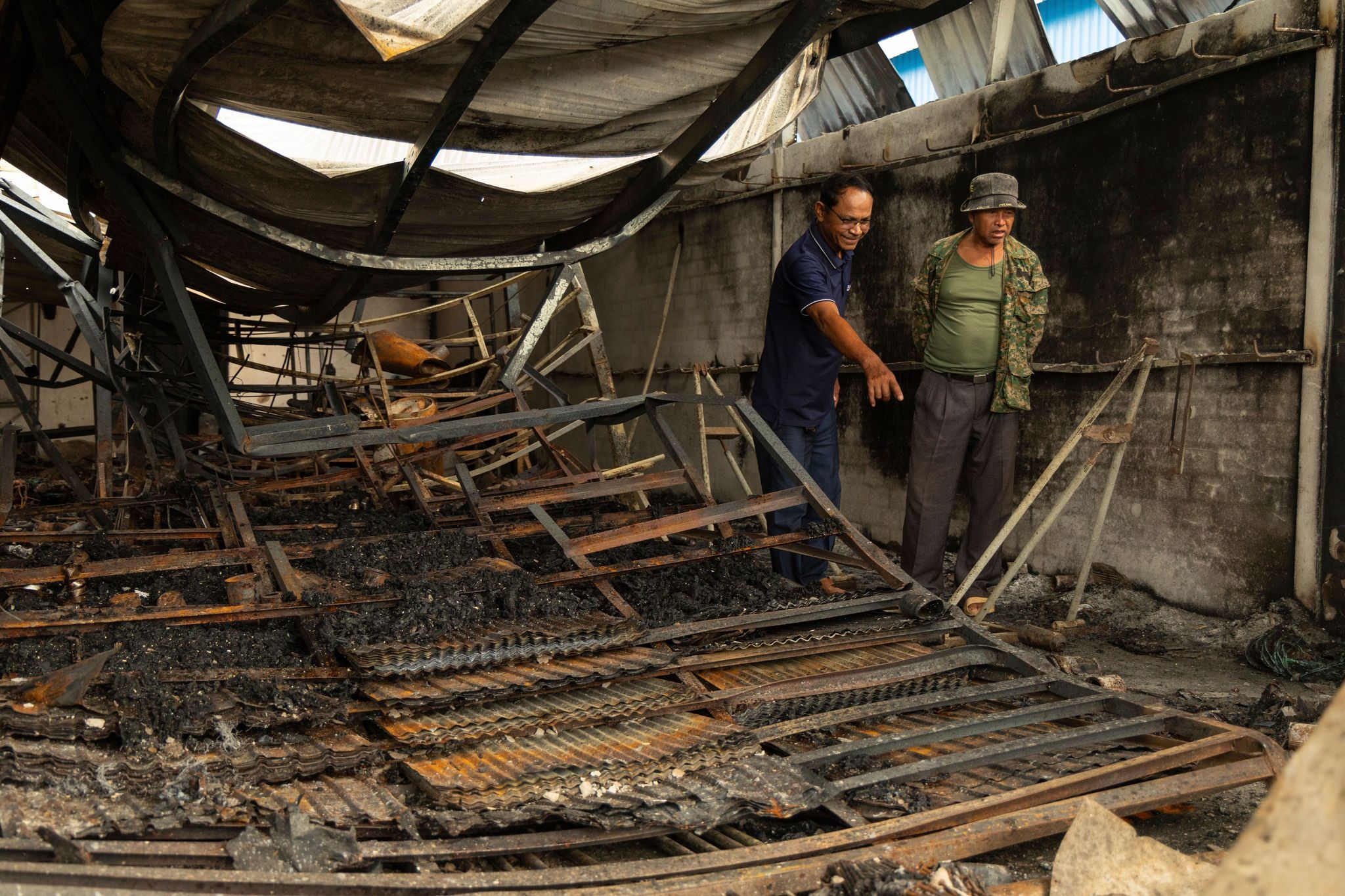 Cambodians return to scenes of destruction after fleeing border fighting with Thailand