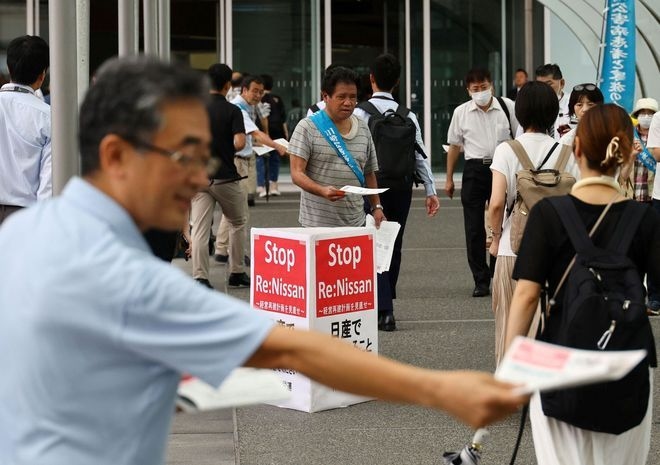 Nissan shareholders assail management over deepening crisis