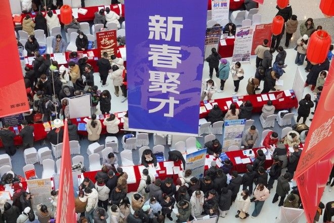 Beneath China's resilient economy, a life of pay cuts and side hustles