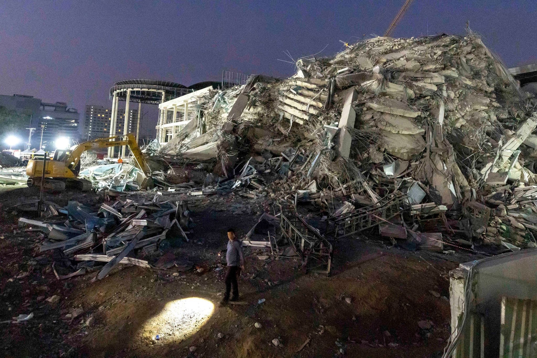 Thai construction magnate surrenders on felony negligence charges over building collapse in quake