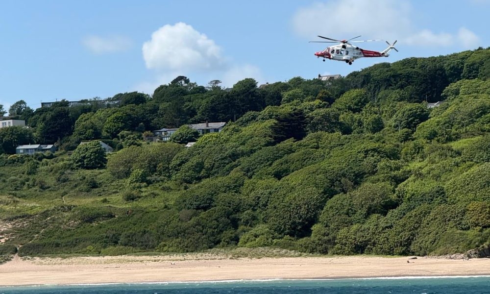 Simultaneous rescues for Tenby lifeboats after paddleboarders blown out to sea