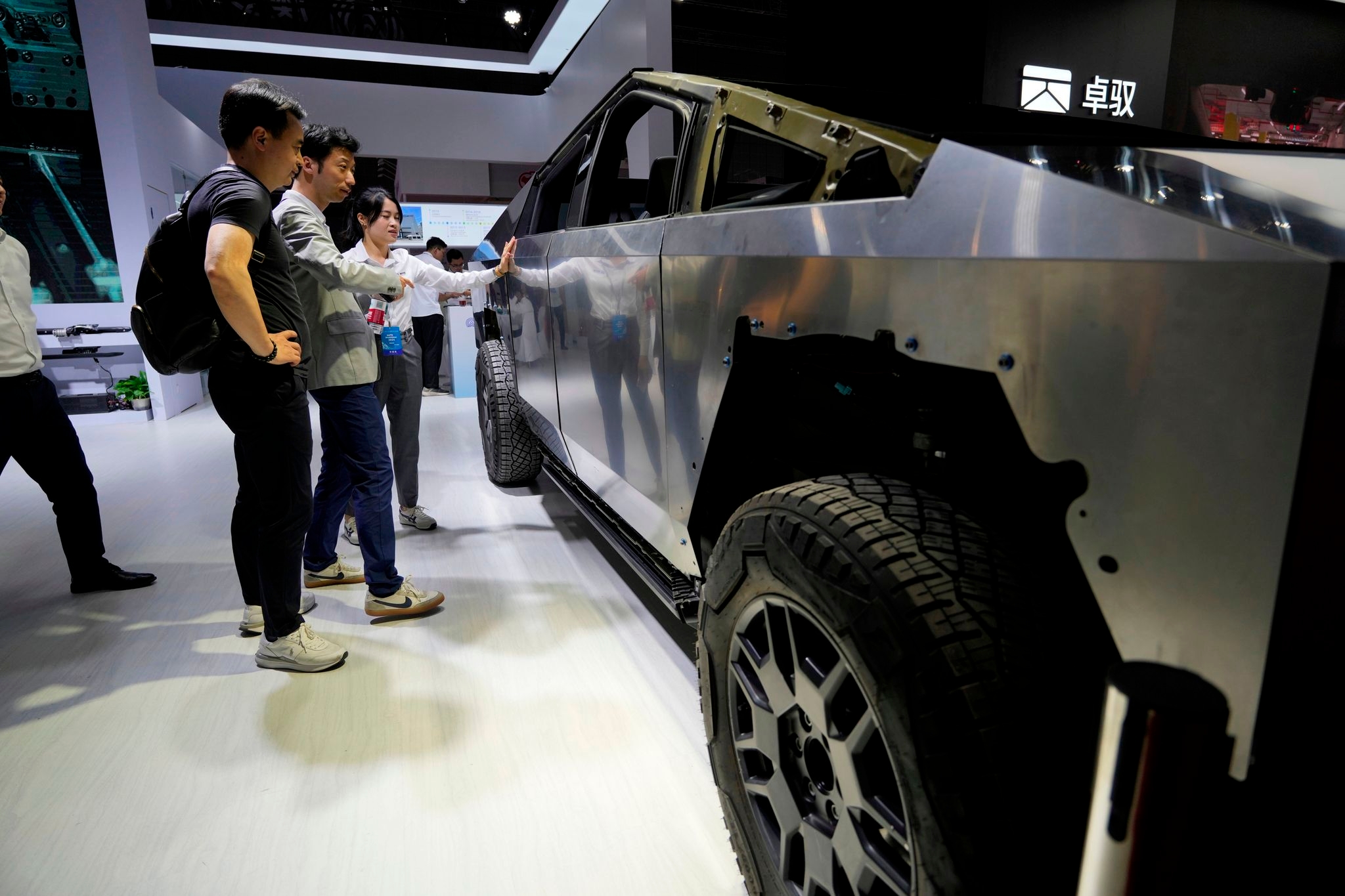 Automakers focus on the global market, chide the US over tariffs at Shanghai's auto show